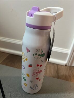 Disney White Water Bottle with Pastel Purple Lid and Colorful Minnie Graphics
